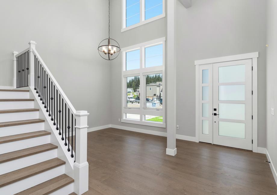 Off the entryway is a flex space for a formal dining room or an additional living space.