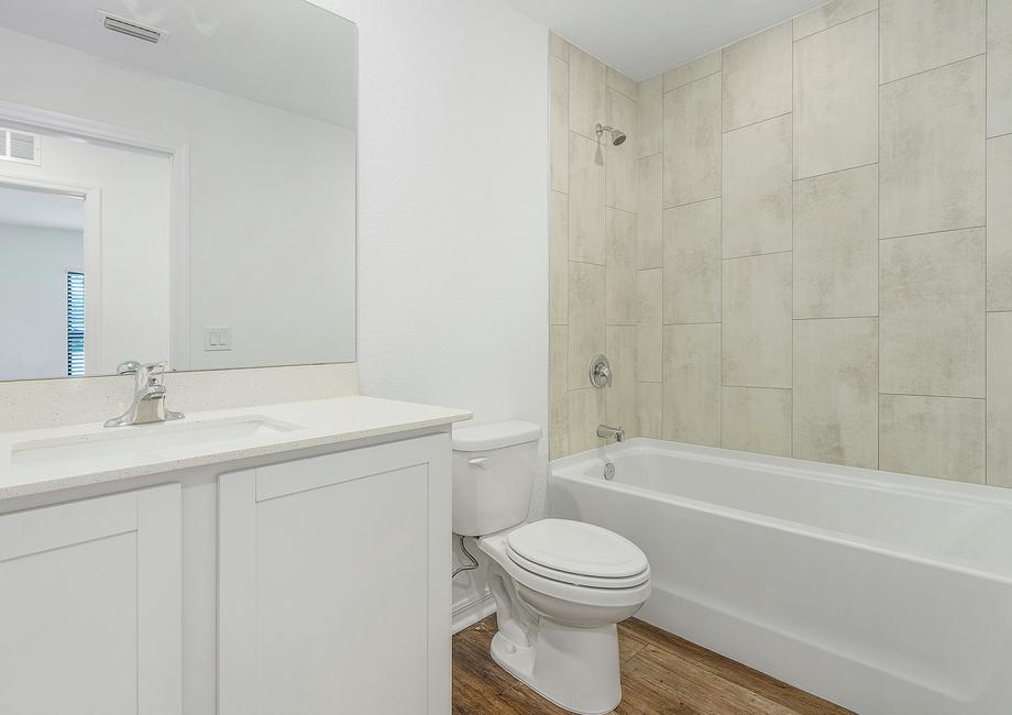 The secondary bathroom has ample space for your guests to get ready
