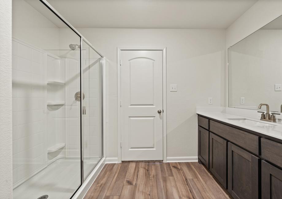 The master bathroom of the Rio Grande includes a large, walk-in, glass shower.