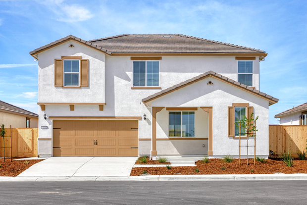 The Nelson is a beautiful two story home.