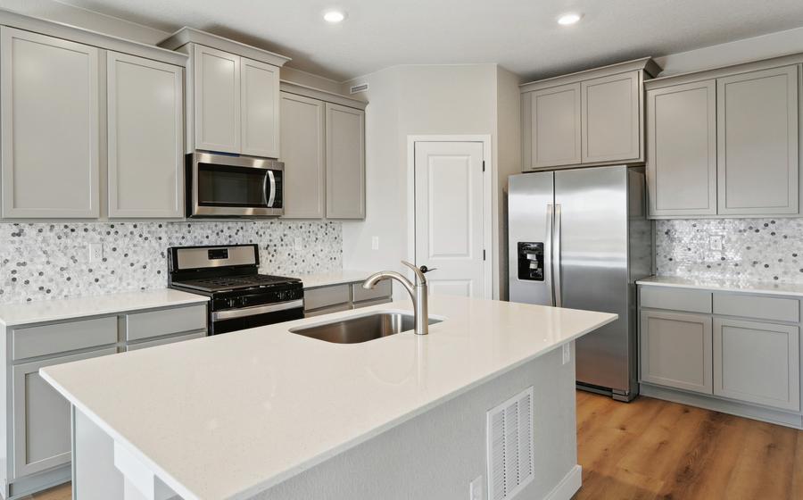 The kitchen of the Pike has beautiful quartz countertops.