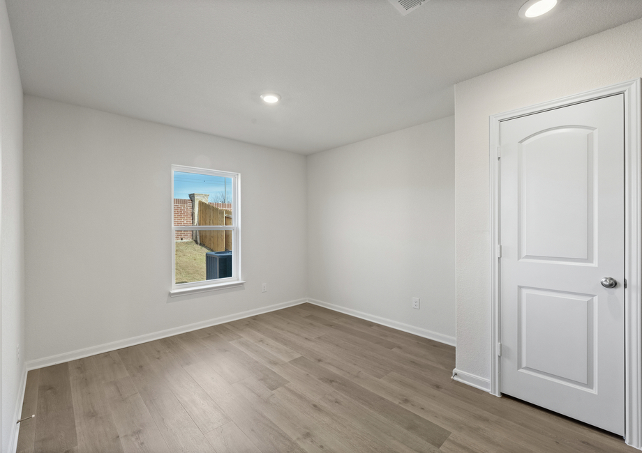 The dining room has a large window that lets in great, natural light.