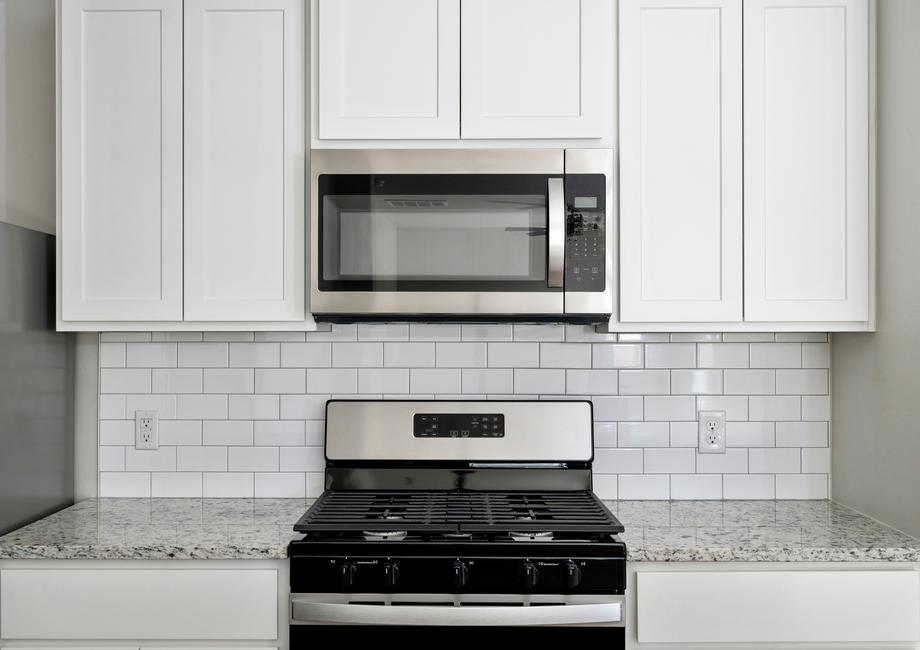 The kitchen of the Klein has a stunning tile backsplash.