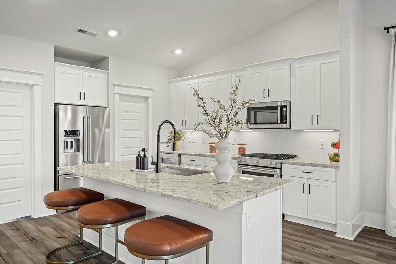 Stainless steel appliances are included.