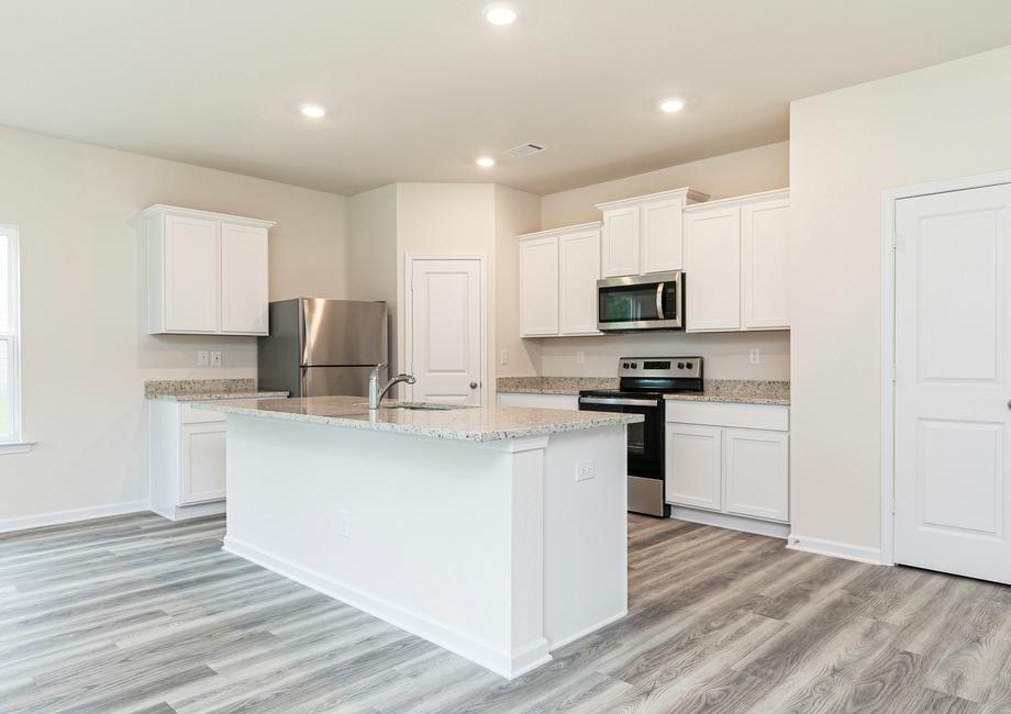 This chef-ready kitchen comes with ample space and stainless steel appliances