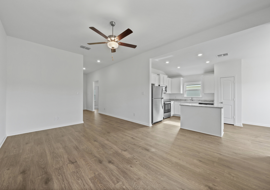 A foyer leads guest into the family room