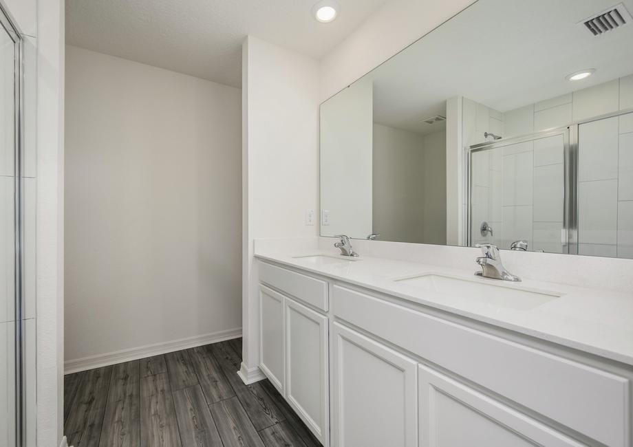 The master bathroom has a double sink vanity making it easy to get ready in the mornings