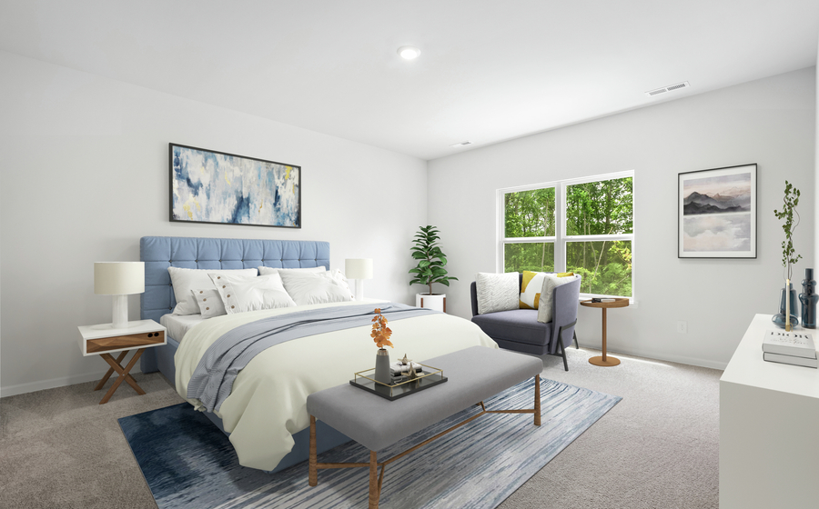 The Clairborne master bedroom has room for a large bed and bed side tables.