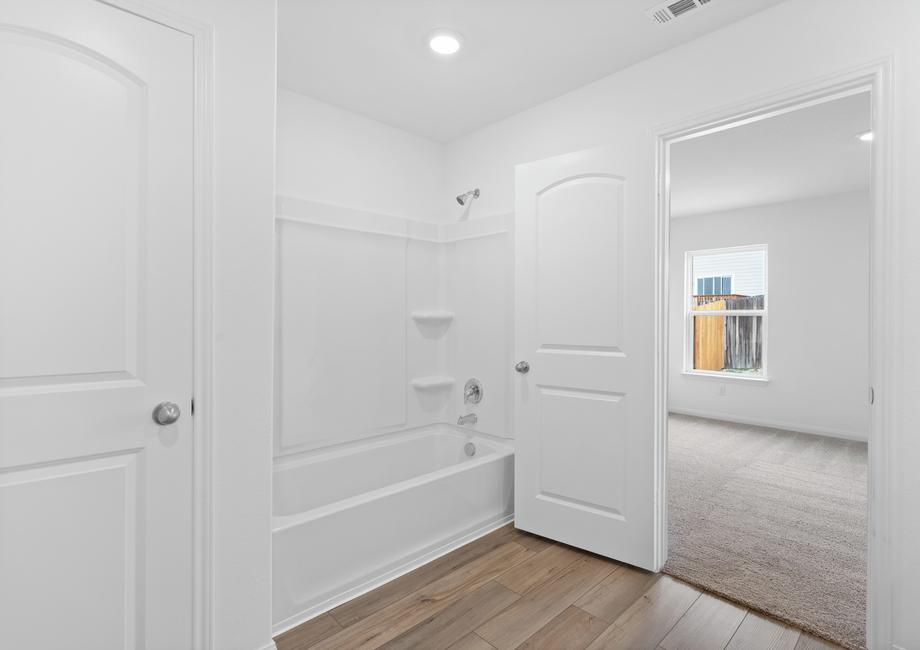 The master bath has a tub/shower combination