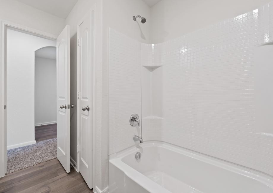 The secondary bathroom of the Reed has a shower-tub combo.