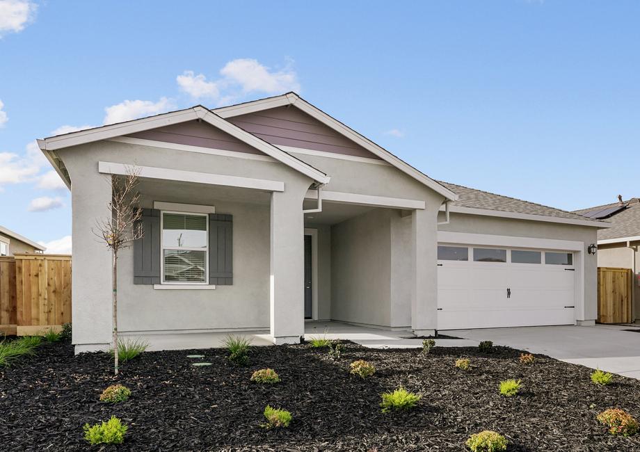 This home has a 2-car garage and a spacious front porch.