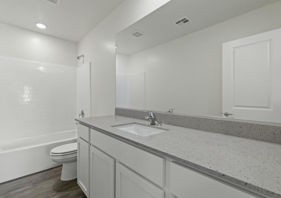 The secondary bathroom has a tub/shower combo.