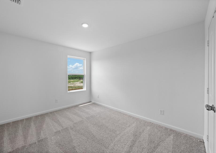 Bedroom with double door closet