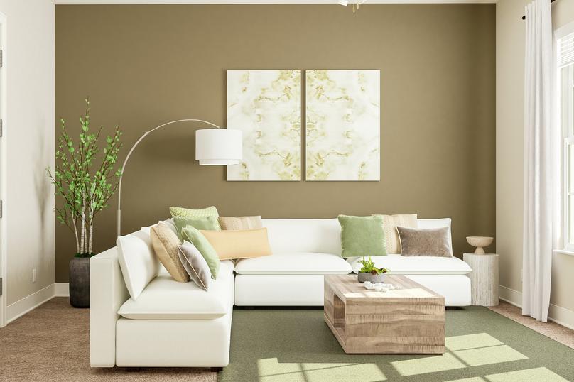 Rendering of sitting area showing a white
  sectional couch and coffee table facing a large window with abstract art and
  beige carpet flooring throughout.