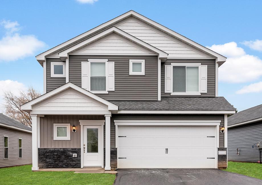 The Cypress is a beautiful two story home with siding.