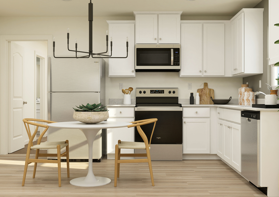 Rendering of a
  kitchen with white cabinetry and stainless-steel appliances. There is also a
  round table in the center of the kitchen.Â 