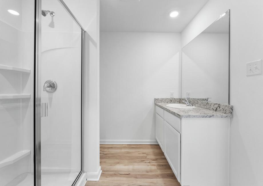 The master bathroom has a large countertop perfect for getting dressed each morning