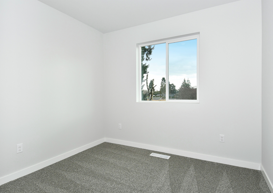 The secondary bedroom has carpet.