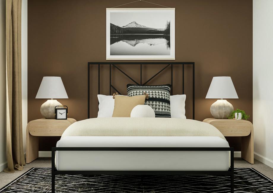 Rendering of a secondary bedroom
  showcasing a large bed and two nightstands along a mocha accent wall.