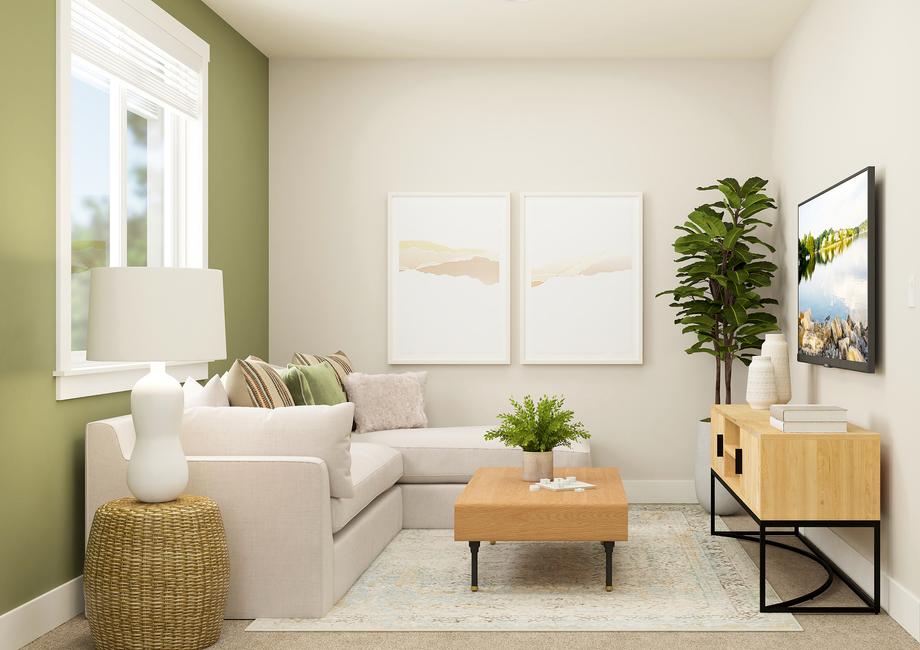 Rendering of the upstairs flex room
  furnished with a white sectional couch and a tv console.