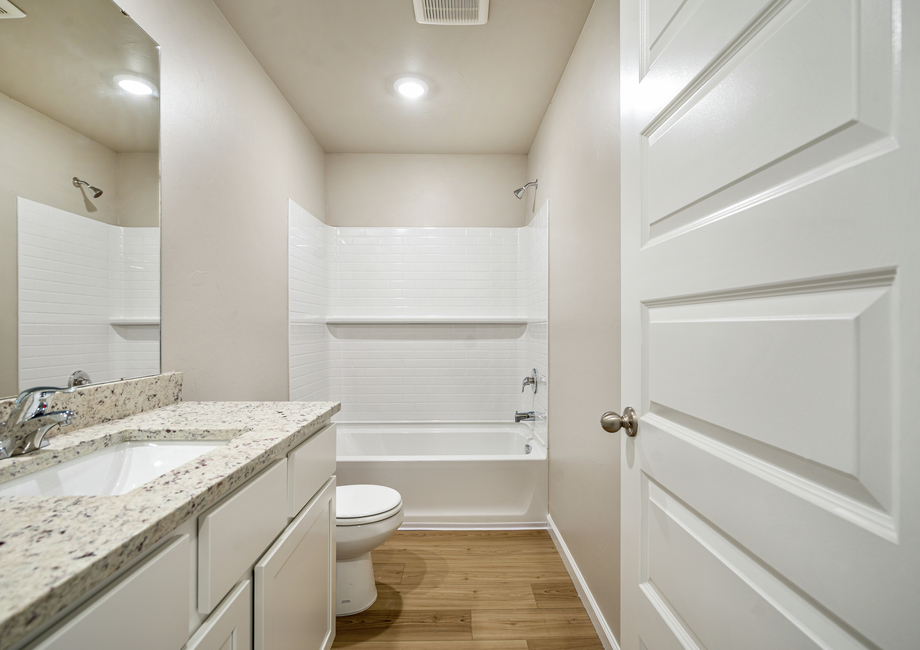 The guest bathrooms have tons of counter space for getting ready.
