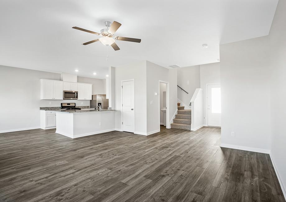 The spacious family room is open to the kitchen and dining area. 