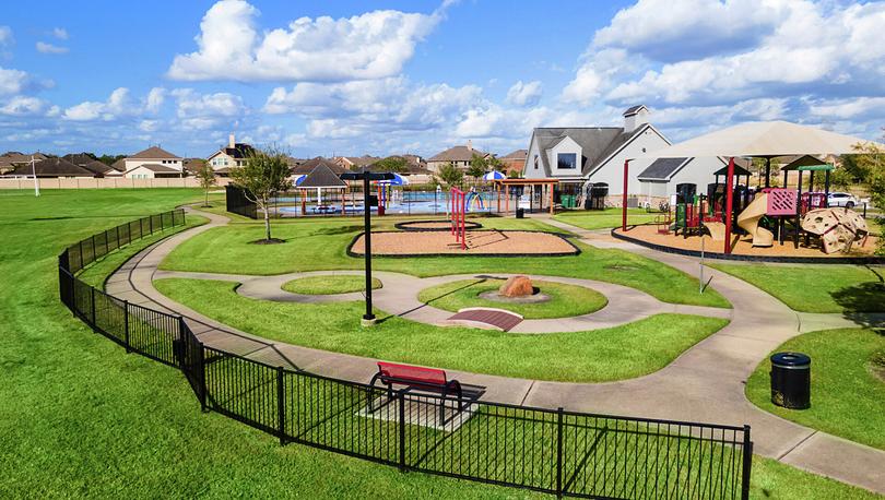 Playground with covered play structure.