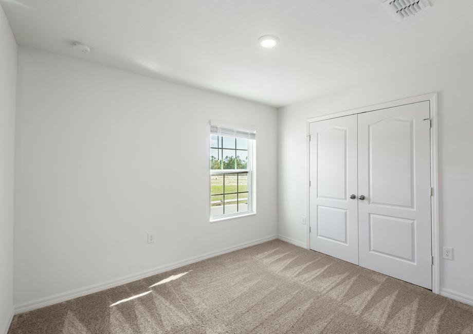 The guest bedrooms are spacious and have plenty of natural light