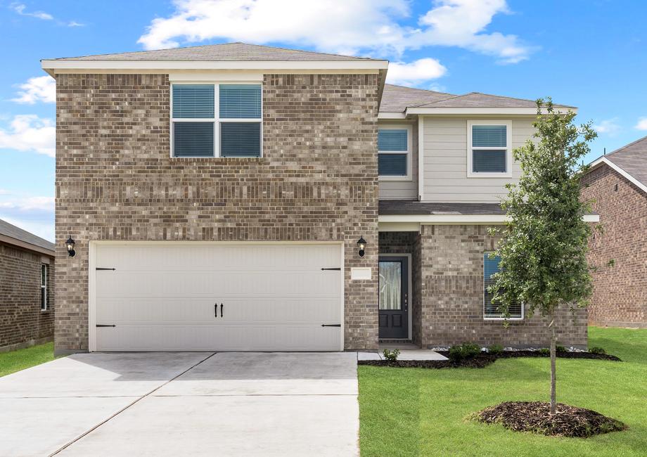 The Driftwood is a beautiful two-story, brick home with siding details.